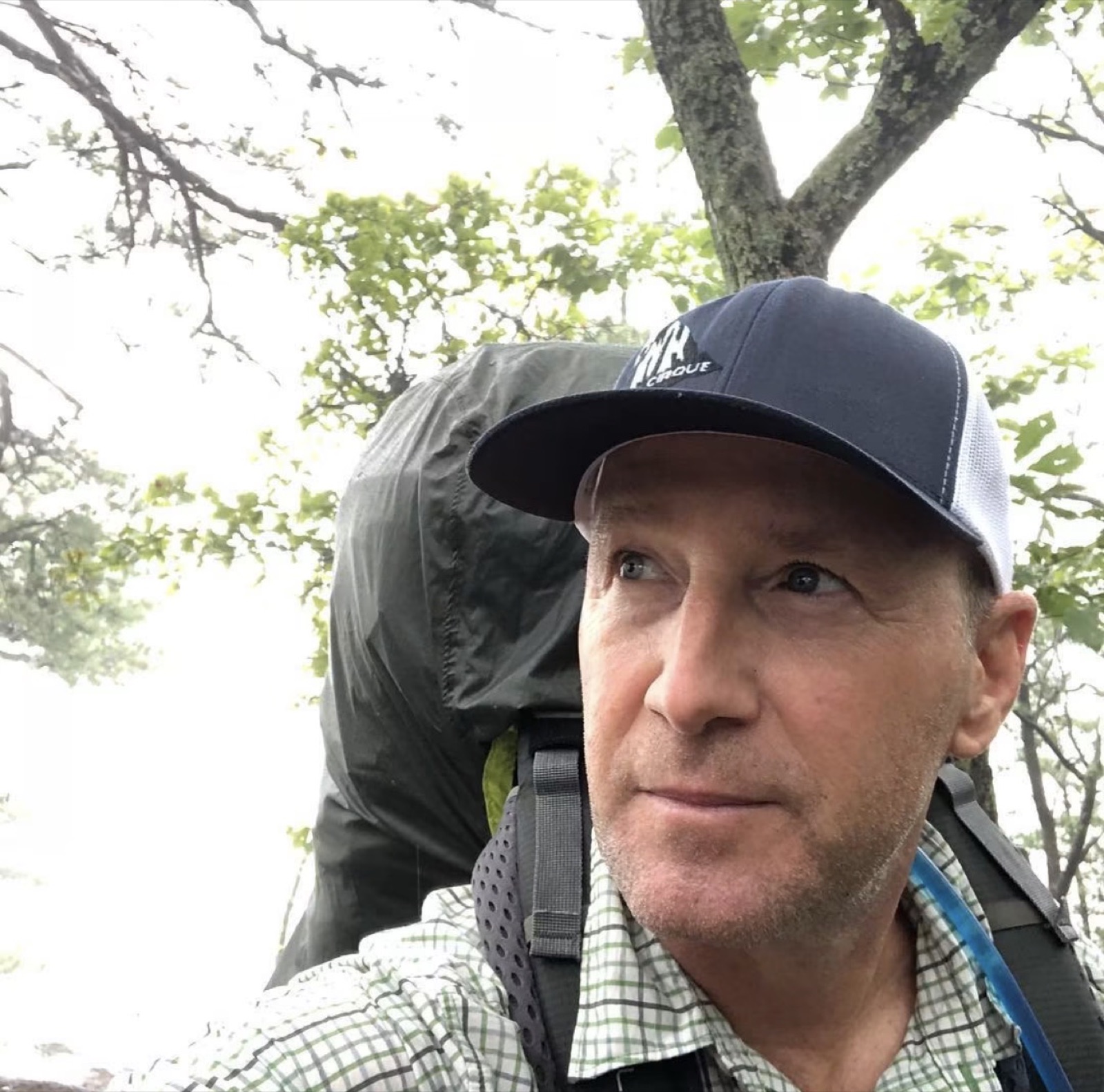 Rob backpacking through fog on the Appalachian Trail during a week-long multi-day hike with a longtime friend — carrying only what they needed, days measured in miles and conversation.